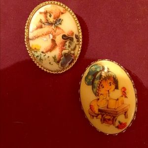 2 Pins 2 inch brooches with adorable designs.